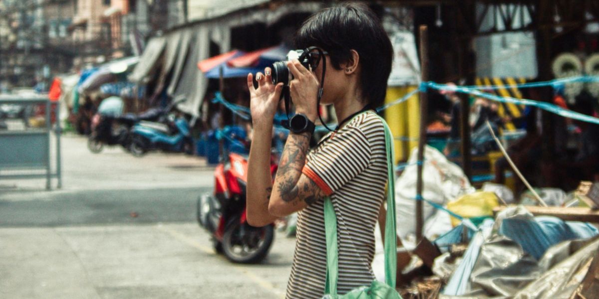 Woman taking outdoor photo