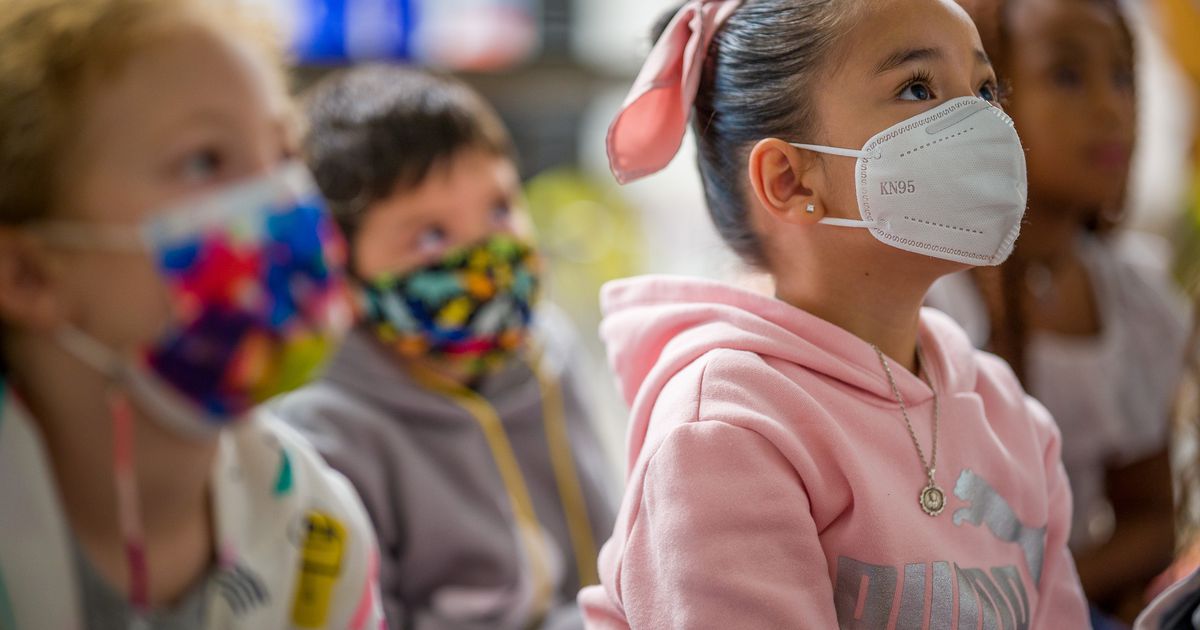 Students wearing masks head and shoulders shot