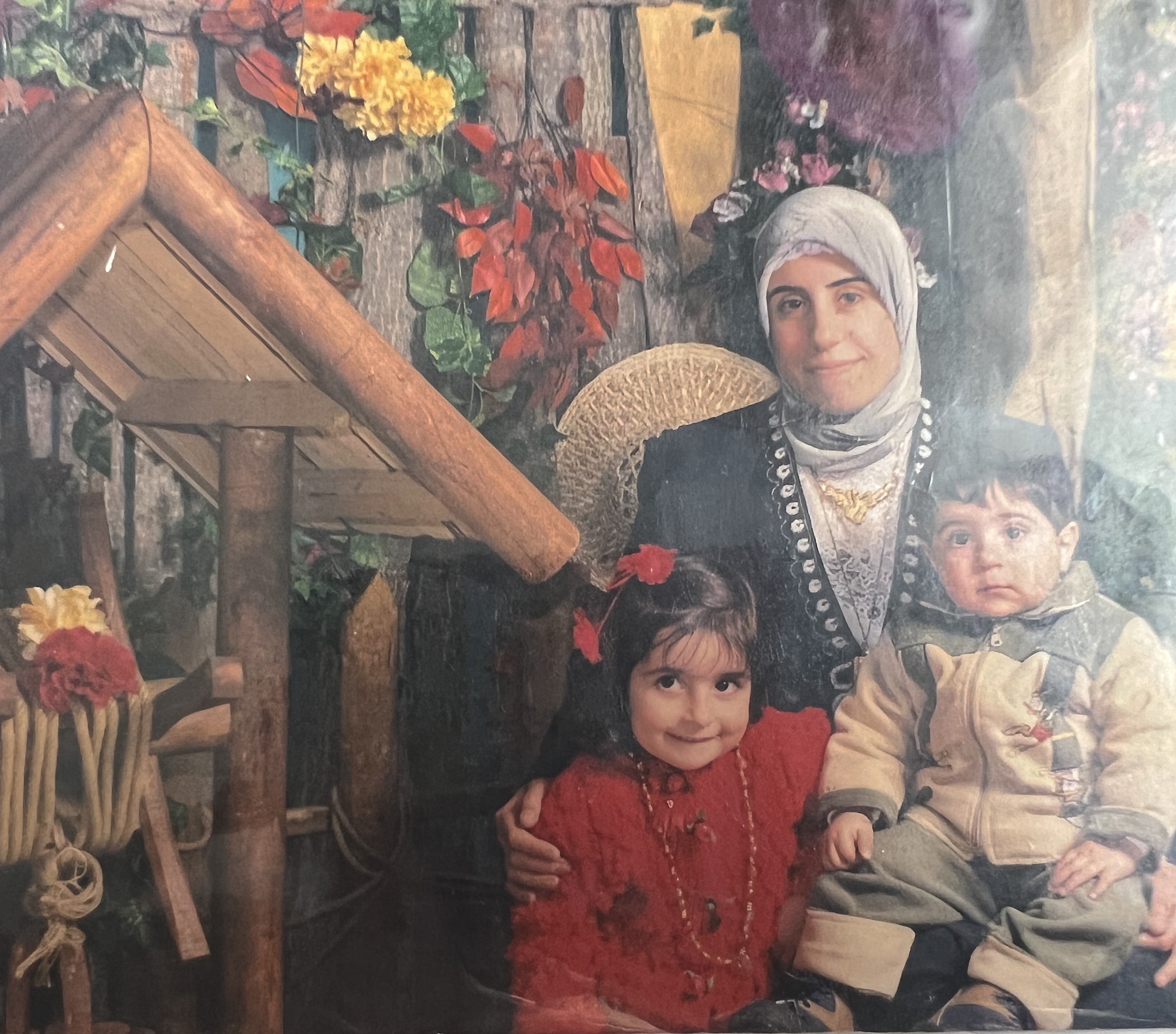 Mom with two children on her lap