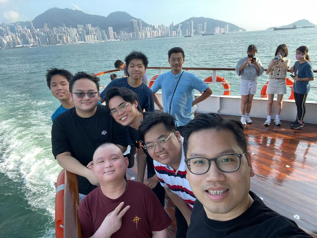 Jesse on the Star Ferry with a group of friends.