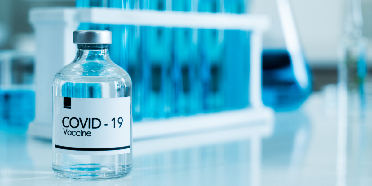 COVID-19 vaccine vial sits on counter of lab