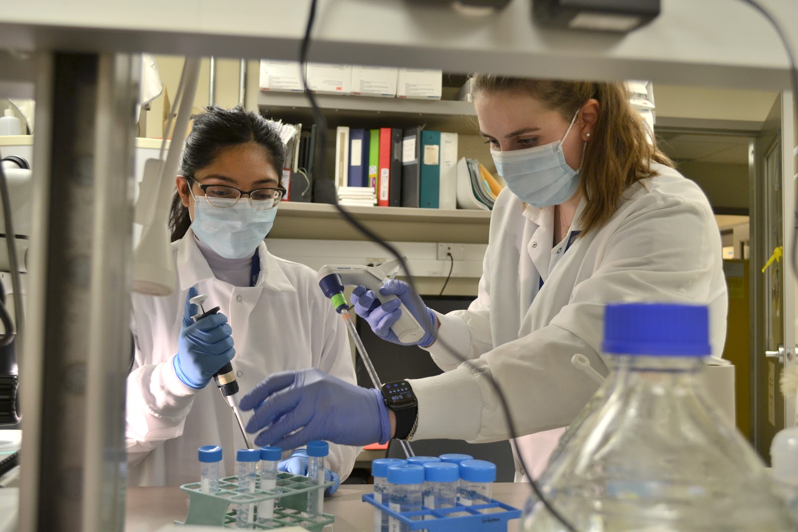 Vriti and her lab mate working in the lab