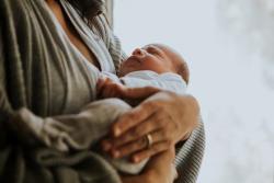 Mother holding infant