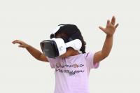 Girl using virtual reality headset