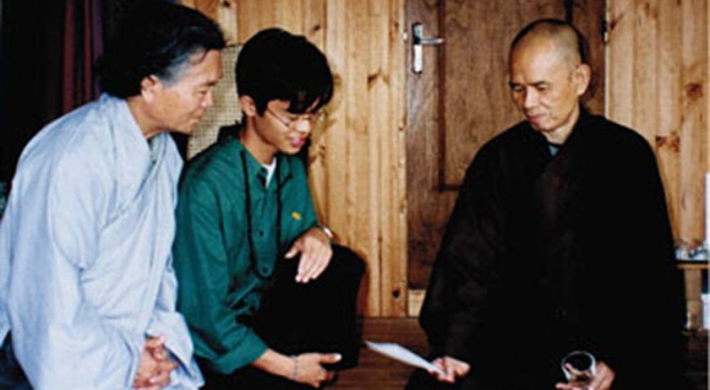 Dzung Vo with his father, Han Vo, and Zen Master Thich Nhat Hanh at the Plum Village Monastery in France in 1999