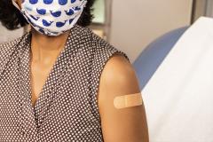 Woman vaccinated with bandaid