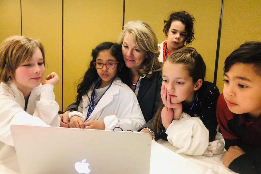 Linda Warner with group of children