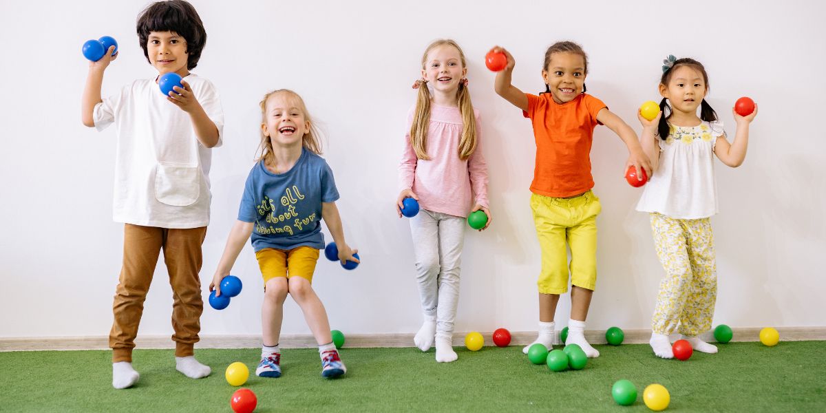 Children throwing little balls