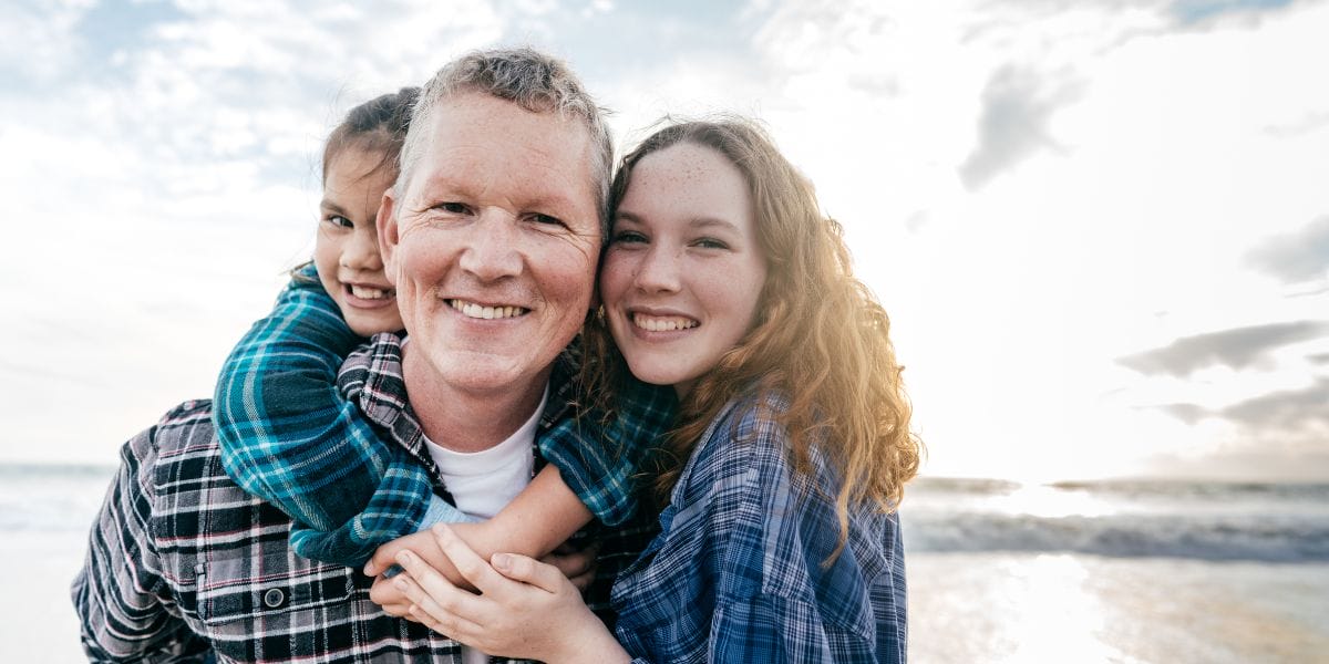Father with two kids outdoors