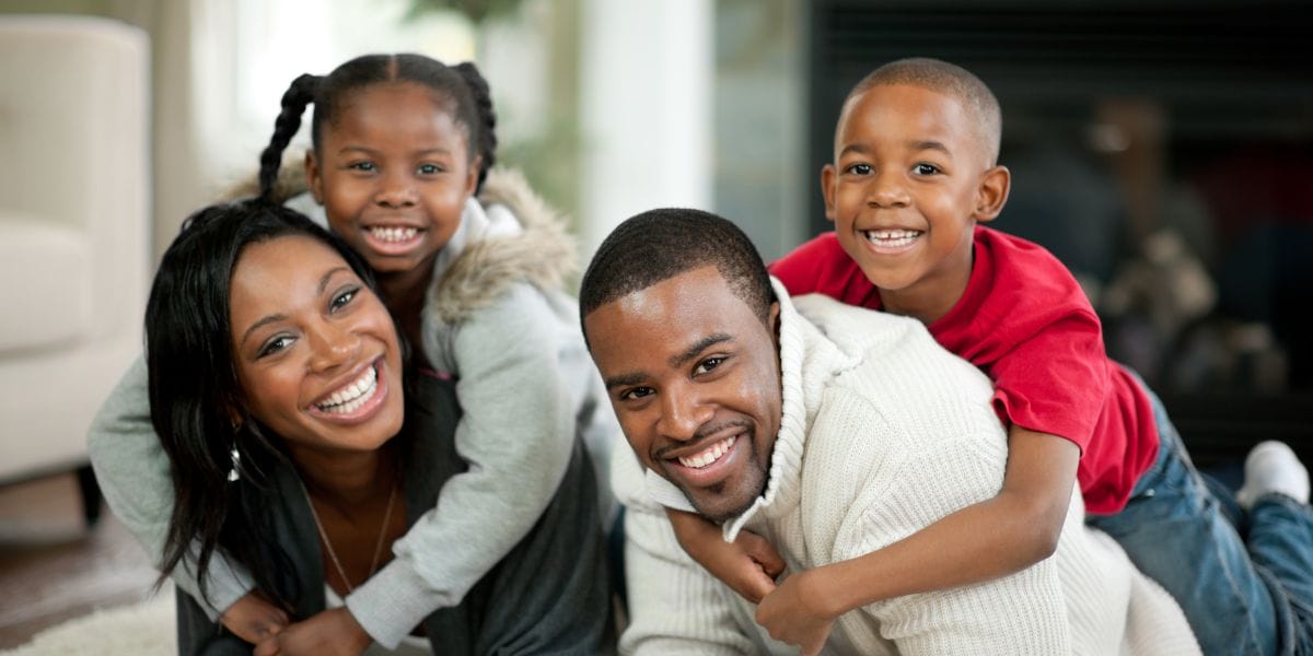 Smiling family with children