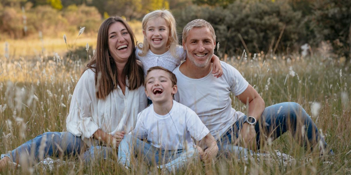 Family sitting on the grass